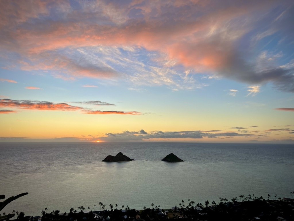 Sunrise over the Mokulua Islands viewed from above Lanikai